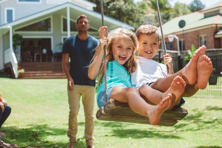 family on swingset