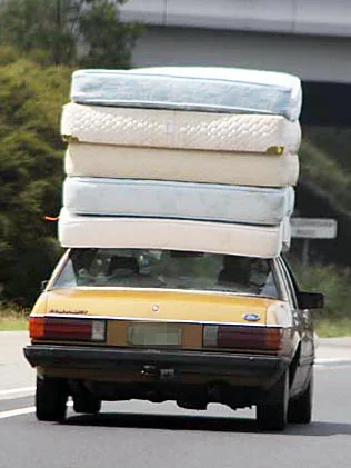 Mattresses on car