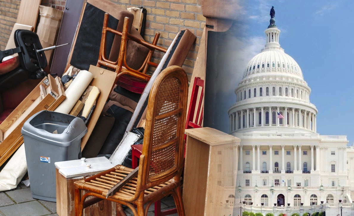 Pile of discarded furniture and household items on the left, with the U.S. Capitol building visible on the right
