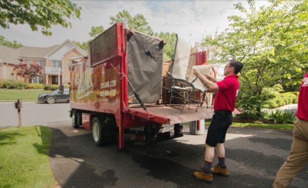 123JUNK Team Packing Junk Into Truck Bed